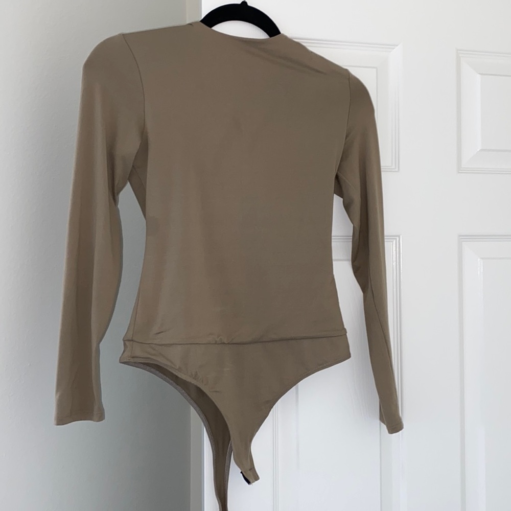 Set of three bodysuits